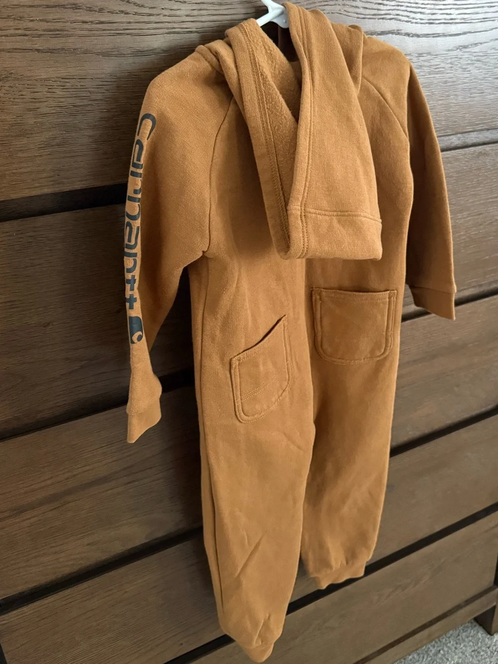 Two Carhartt Kids Hooded Zip One-Pieces in Carhartt Brown and dark navy